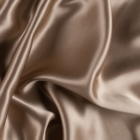 Luxurious dark brown silk texture representing the elegance of Midnight Seduction perfume by ScentSociety