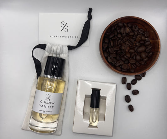 Perfume bottle and gift set with coffee beans representing rich cherry and spicy notes of Golden Vanille fragrance by ScentSociety