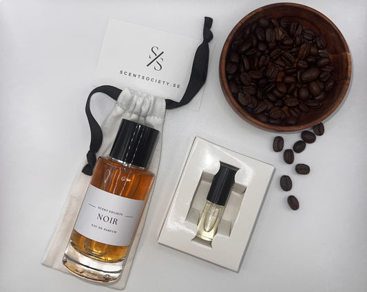 Perfume bottle and gift set with coffee beans representing rich cherry and spicy notes of Honeywood fragrance by ScentSociety